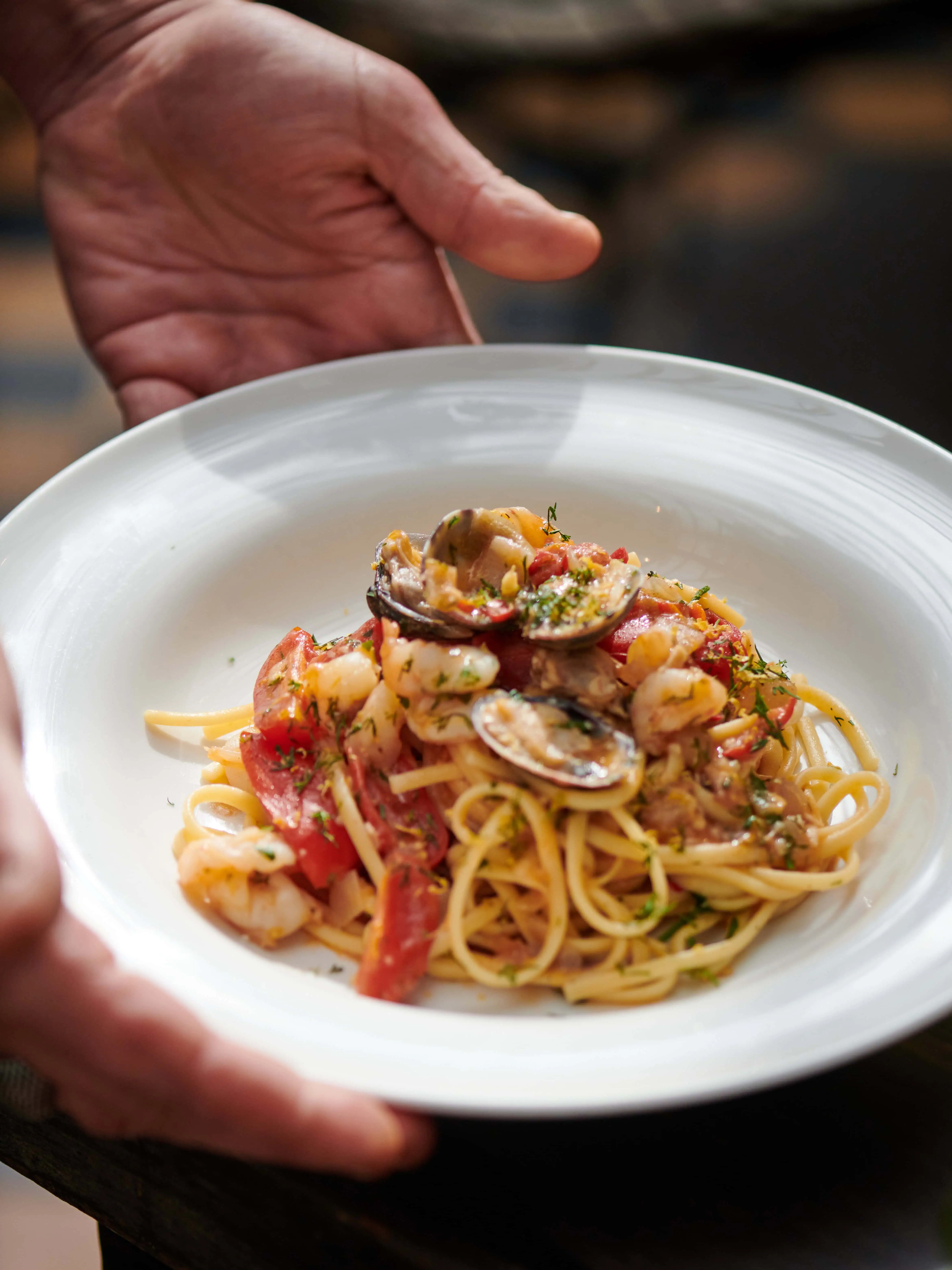 0019 - 2021 - Gees Restaurant & Bar - Oxford - High res - Food Hands Pasta Seafood